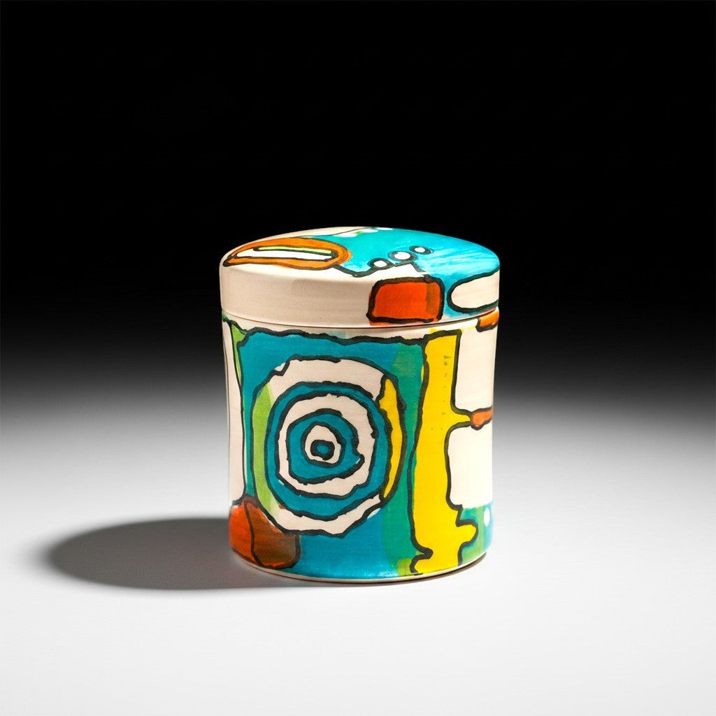 CeramicMeltdown.com hand-painted lidded jar with abstract blue, yellow, and orange design.