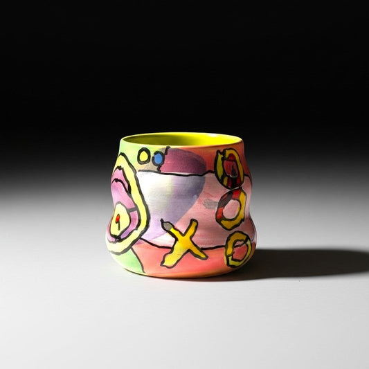 CeramicMeltdown.com abstract expressionist cocktail cup, hand-painted with vibrant colors and bold strokes. Features organic shape and yellow interior.