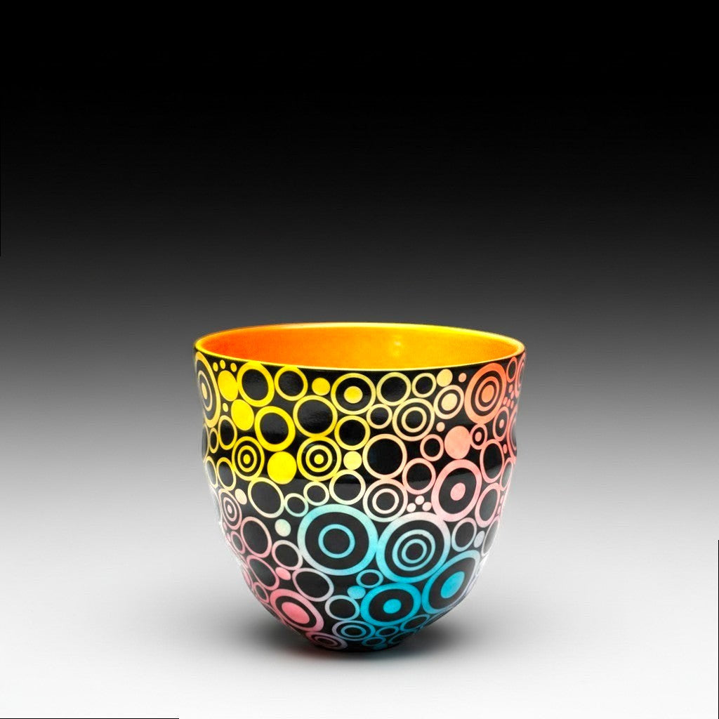 CeramicMeltdown.com rainbow gradient circle pattern ceramic bowl with orange interior.