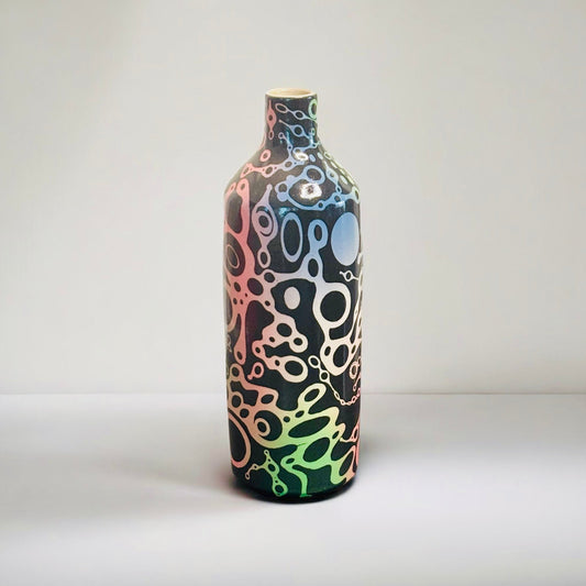 Vase with colorful abstract pattern on a white background