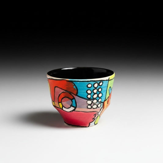 CeramicMeltdown.com abstract expressionist sherry sipper cup with hand-painted colorful design and black interior.