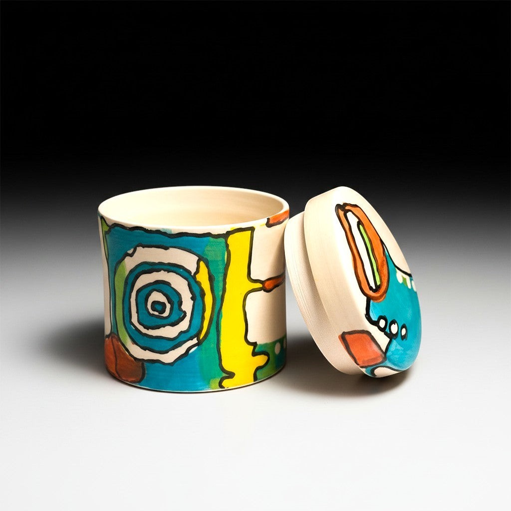 CeramicMeltdown.com hand-painted lidded jar with abstract blue, yellow, and white design. Ceramic storage container.