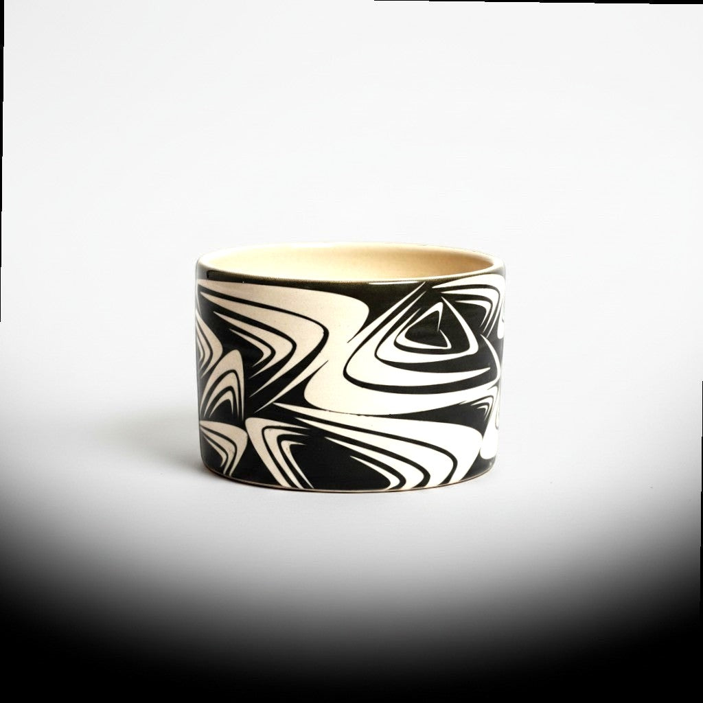 CeramicMeltdown.com Wave Catch All Bowl in black and white abstract pattern. Ceramic material.
