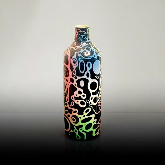 CeramicMeltdown.com handmade white ceramic bottle with ameba-like texture and rainbow gradient pattern. Narrow neck.