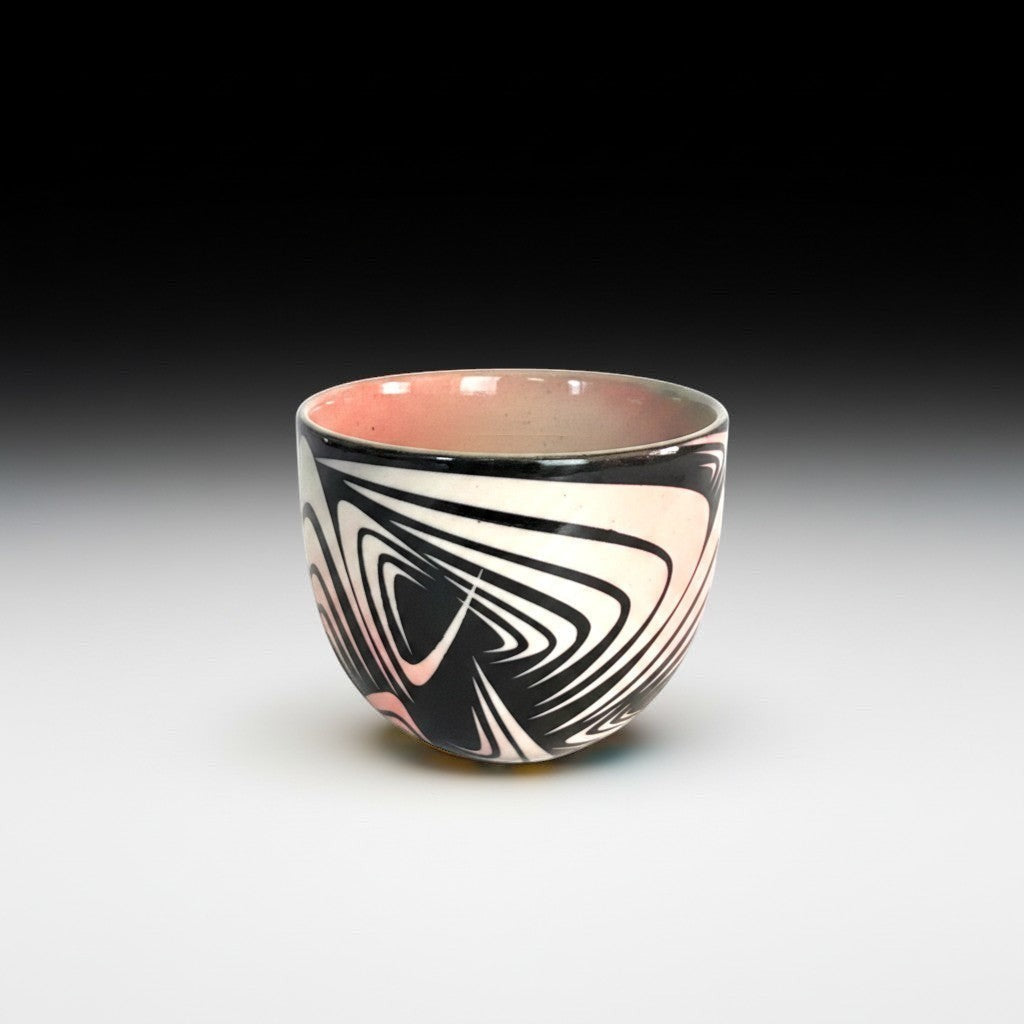 CeramicMeltdown.com wine cup with black, white, and pink wave pattern. Handcrafted ceramic with a smooth finish.